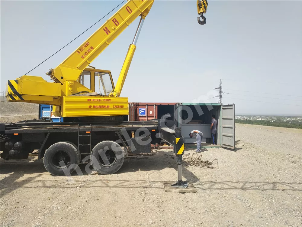 Installazione della macchina per la goffratura delle porte in acciaio HARSLE in Uzbekistan
