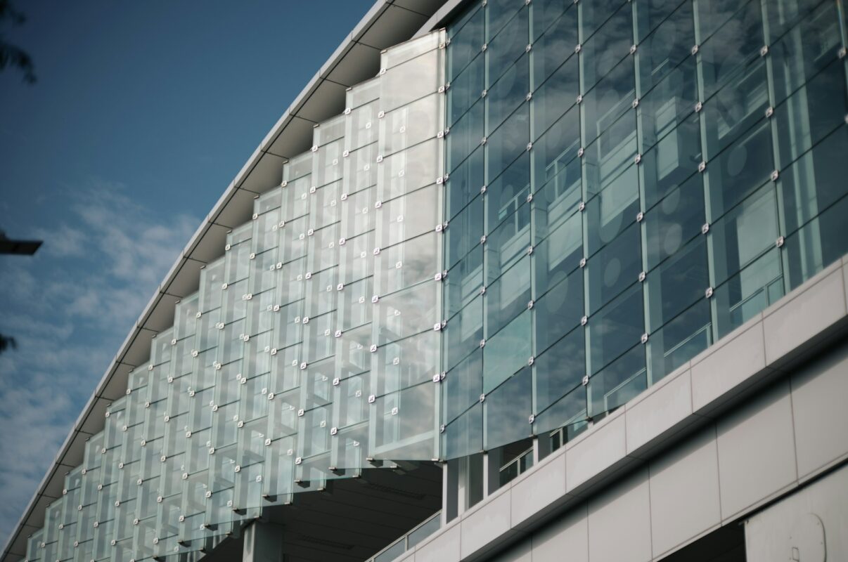 Curved glass and metal curtain wall facade