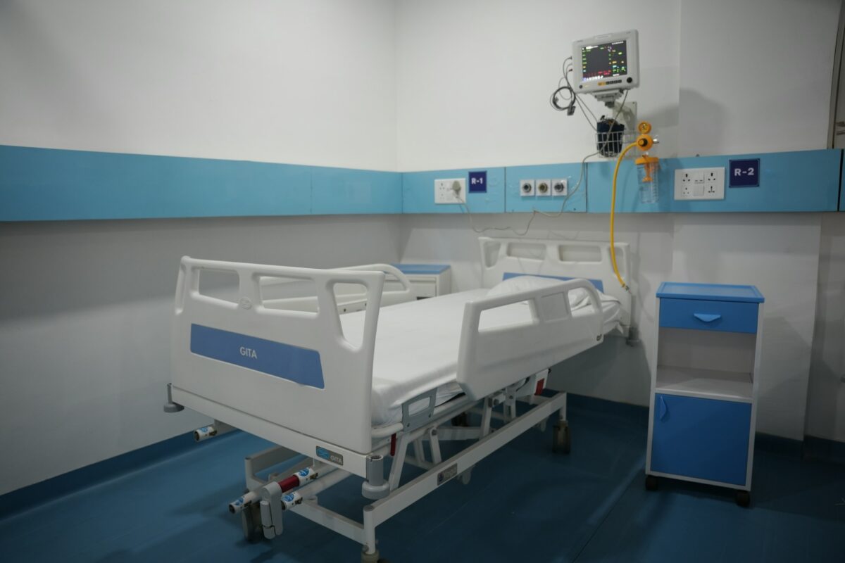 Hospital bed and medical equipment in a ward