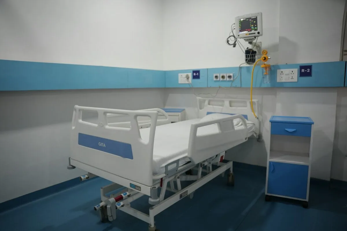 Hospital bed and medical equipment in a ward
